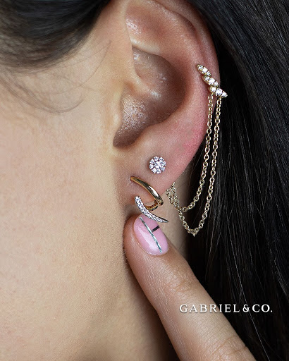 Explore lesbian couple tattoo ideas, creative tattoo ideas in West Hempstead, available at Contempo Jewelers