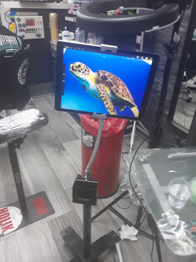 Ear Piercing Service «INKAHOLIK TATTOOS», reviews and photos, 8367 SW 40th St, Miami, FL 33155, USA