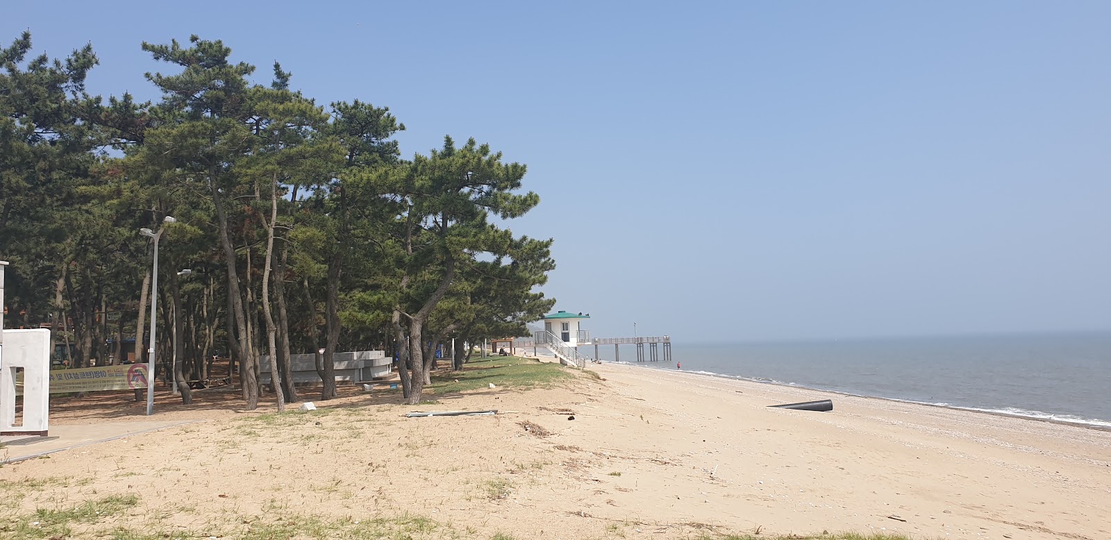 Photo of Ongam Beach and the settlement