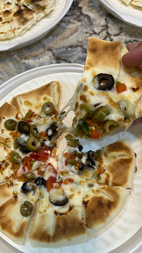 بيتزا وفطاير الاسمر 