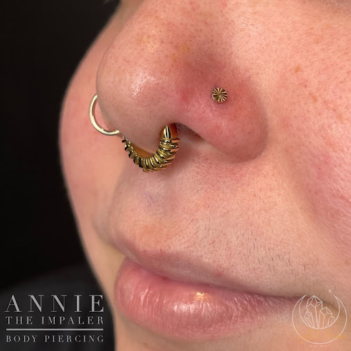 Explore throat tattoo ideas, creative tattoo ideas in Bloomington, available at Crystal Moon Body Arts