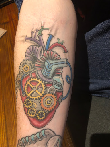 Find beach scene tattoo ideas for your next unique tattoo in Winter Park at Beyond Ink Tattoo & Body Piercing