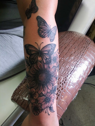 Explore name sleeve tattoo ideas, creative tattoo ideas in Hanover, available at Josiah Morgan Tattooer