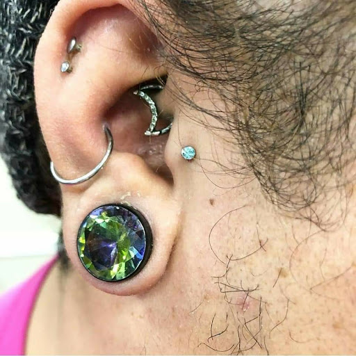 Explore evolution tattoo ideas, creative tattoo ideas in North Charleston, available at Exotic Impressions Body Piercing