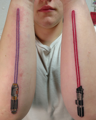 Explore angel forearm tattoo ideas, creative tattoo ideas in Marietta, available at Monkeys Uncle Tattoo