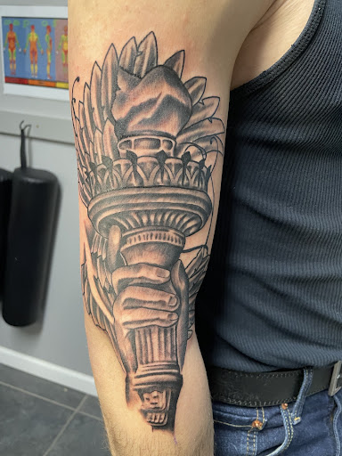 Explore egyptian god tattoo ideas, creative tattoo ideas in Rapid City, available at Torch Lake Ink