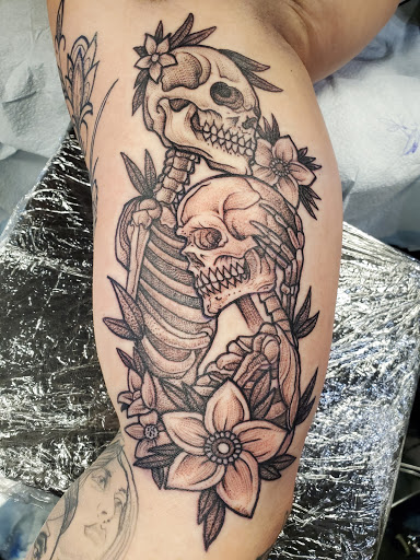 Explore punk rock tattoo ideas, creative tattoo ideas in Buford, available at Inked Arts Tattoo Studio