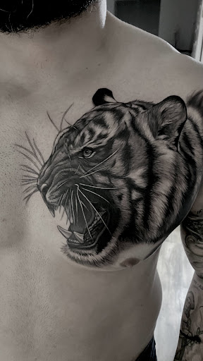 Explore rock n roll tattoo ideas, creative tattoo ideas in Round Rock, available at TONALink Tattoo