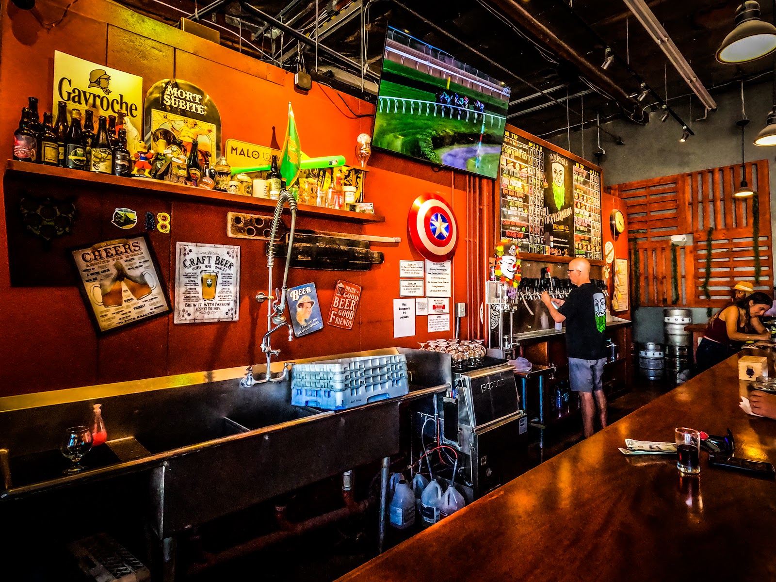 Beer taps lined up on a bar