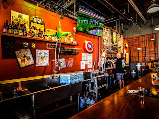 A pint of beer on a bar