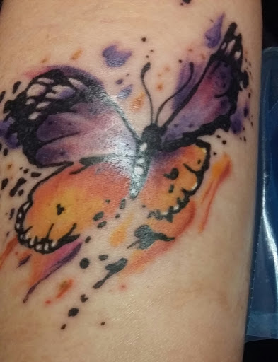 Explore connect tattoo ideas, creative tattoo ideas in Council Bluffs, available at Lil Bros Tattoo
