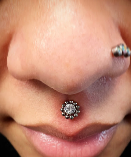 Explore mens family sleeve tattoo ideas, creative tattoo ideas in Bay Shore, available at Piercings By Dean 95