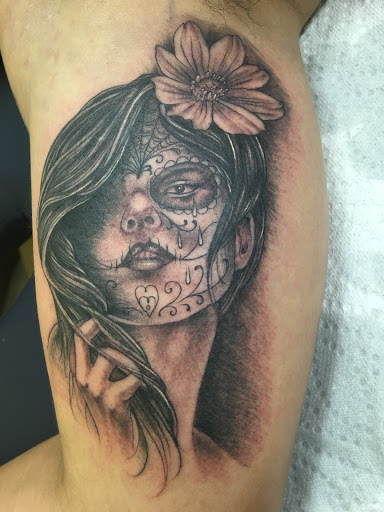 Explore five finger death punch tattoo ideas, creative tattoo ideas in Marysville, available at Elegant Arts Tattoo Parlor