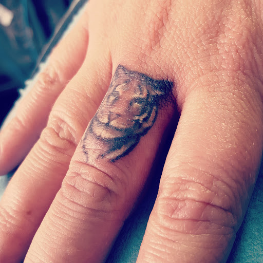 Explore design tattoo ideas for men, creative tattoo ideas in Tucson, available at Broken Clover Tattoo and Piercing