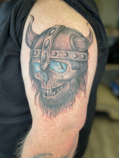 Explore stitch and angel tattoo ideas, creative tattoo ideas in Watford City, available at Soulful Ink Studios