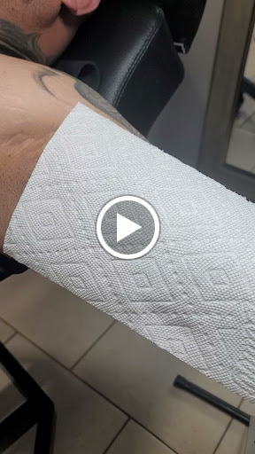 Explore country tattoo ideas for men, creative tattoo ideas in Ocoee, available at Slaughterized Ink Tattoo and Piercing Studio