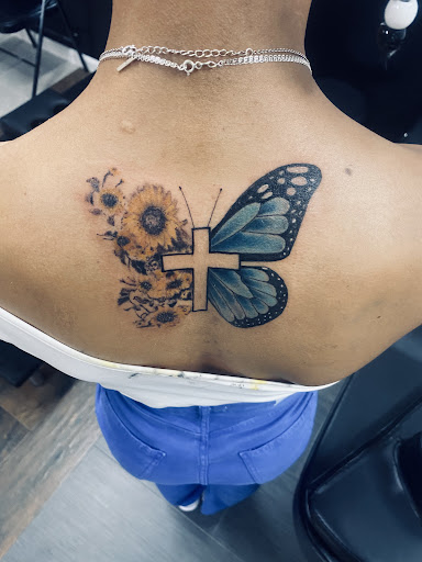 Explore sternum tattoo ideas for females, creative tattoo ideas in Lakeville, available at Savage Ink