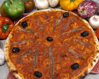 Plats et boissons du Pizzas à emporter Pizza au feu de bois GUIDO à Nîmes - n°20