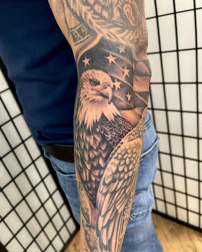 Explore climbing tattoo ideas, creative tattoo ideas in Kenosha, available at Kenosha Tattoo Company