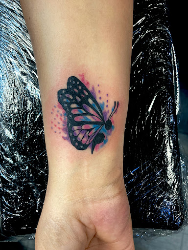 Explore lover tattoo ideas, creative tattoo ideas in West Union, available at Status Tattoo