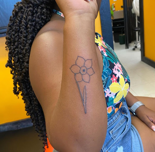 Explore donut tattoo ideas, creative tattoo ideas in Millsboro, available at Tattoo Galaxy (Millsboro) Piercing & Custom tattoos