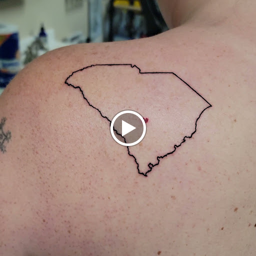 Explore blue flame tattoo ideas, creative tattoo ideas in Traverse City, available at Pinups & Needles