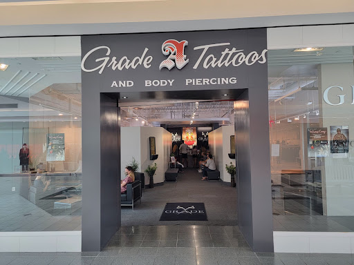 Explore lower stomach tattoo ideas, creative tattoo ideas in Fort Wayne, available at Grade A Tattoos and Body Piercing