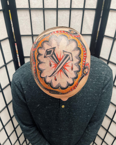 Explore red ink neck tattoo ideas, creative tattoo ideas in Concord, available at Sterling Tattoo Club