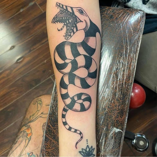 Explore dory tattoo ideas, creative tattoo ideas in Mobile, available at Old Familiar Tattoo Company