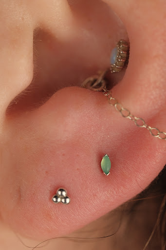 Explore small tattoo cover up ideas, creative tattoo ideas in Buffalo, available at Moria Piercing and Jewelry