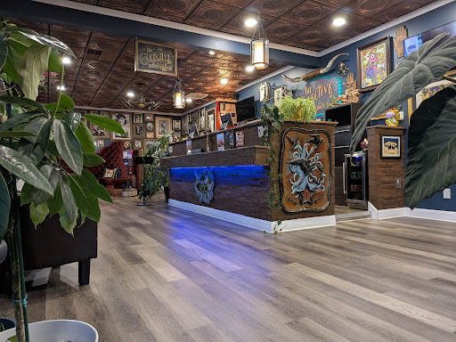 Explore cherubim tattoo ideas, creative tattoo ideas in Virginia Beach, available at The Collective Tattoo & Body Piercing