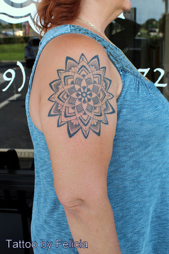 Explore tattoo name cover up ideas on wrist, creative tattoo ideas in Fort Myers, available at Tiger Lotus Tattoo and Piercing