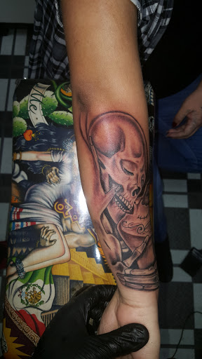 Explore hustle tattoo ideas, creative tattoo ideas in Los Angeles, available at South Central Tattoos