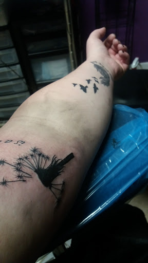 Tattoo Shop «Sacred Ink Tattoo», reviews and photos, 2707 E Court St, Flint, MI 48503, USA