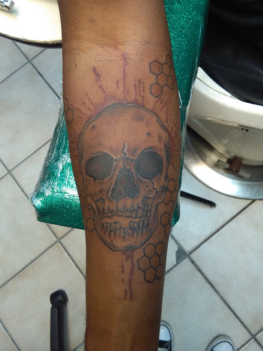 Explore hard work tattoo ideas, creative tattoo ideas in Bradenton, available at Memory Lane Tattoo Co.