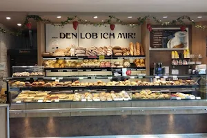 Bäckerei & Konditorei Peter Lob | Backshop im REWE-Markt Koll in Kürten image