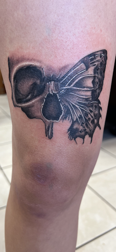 Explore july birth flower tattoo ideas, creative tattoo ideas in Osage Beach, available at Lake Ozark Tattoo and Hair Studio