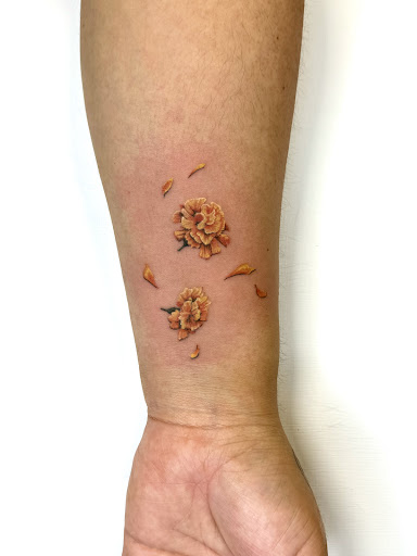Explore floral sleeve tattoo ideas, creative tattoo ideas in Lafayette, available at Syzygy tattoo