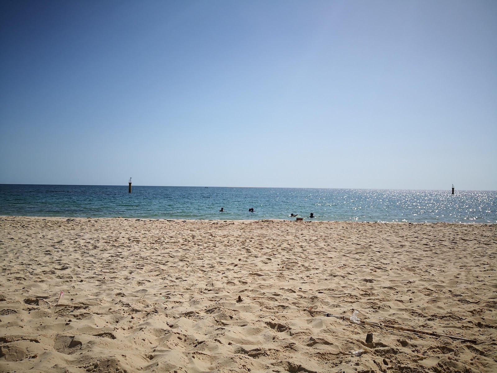 Valokuva Plage Mariemista. pinnalla valkoinen hiekka:n kanssa