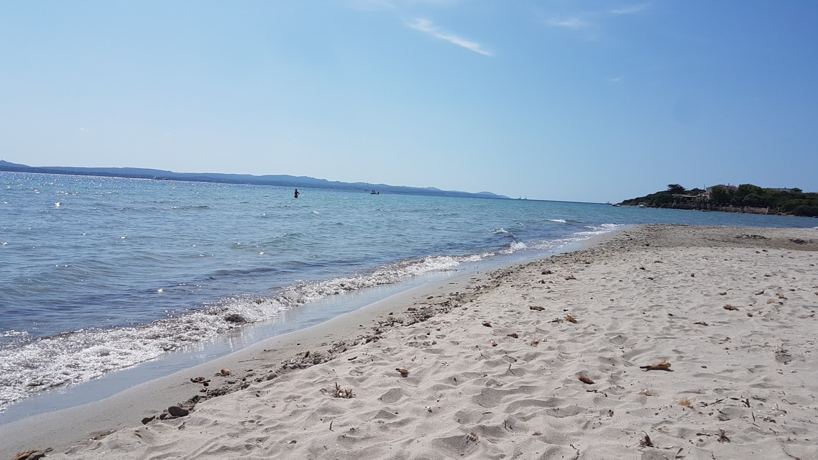 Foto av Giunco beach med turkos rent vatten yta
