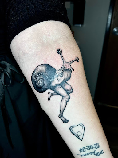 Explore love and war tattoo ideas, creative tattoo ideas in Westland, available at Premier Tattoo Company Westland