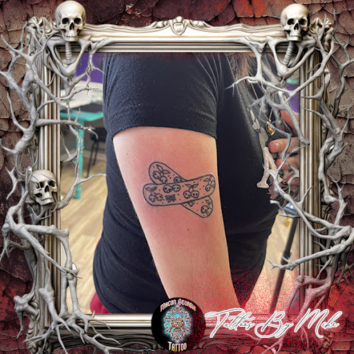 Explore cancer awareness tattoo ideas, creative tattoo ideas in Macon, available at Macon Georgia Tattoo