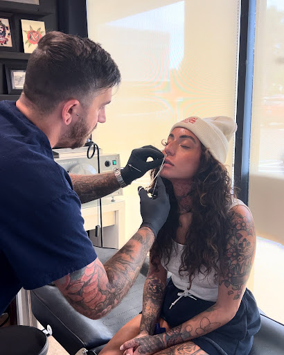 Explore palm tree tattoo ideas, creative tattoo ideas in Delray Beach, available at Riot Piercing and Permanent Jewelry