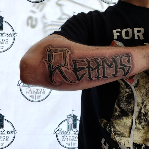 Explore brother tattoos ideas, creative tattoo ideas in Milwaukee, available at Bay Street Tattoo Co.