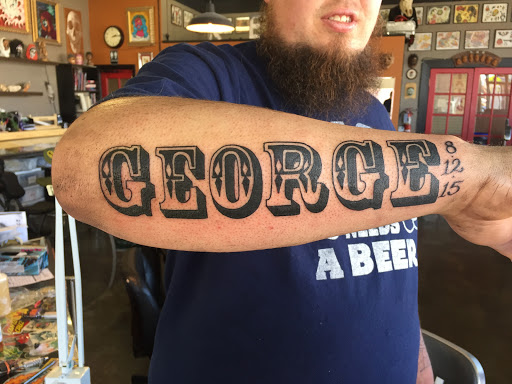 Explore red string tattoo ideas, creative tattoo ideas in Reno, available at Aces Tattoo