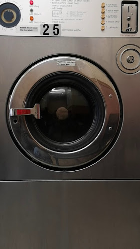 P D Launderette - Laundry service