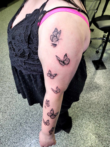 Explore butterfly arm tattoo ideas, creative tattoo ideas in Streetsboro, available at Surreal Image Tattoos