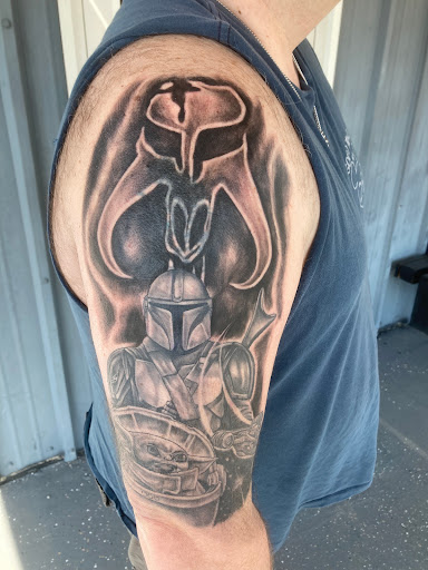 Explore black bird tattoo ideas, creative tattoo ideas in Myrtle Beach, available at Elite Ink Tattoos of Myrtle Beach