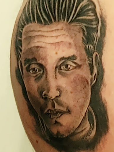 Explore tattoo ideas paw print, creative tattoo ideas in Charlotte, available at Tattoos by Jamison