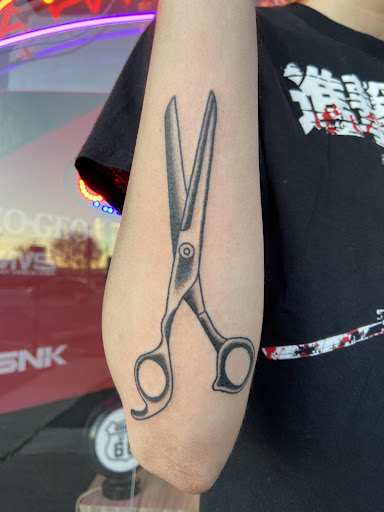 Explore headstone tattoo ideas, creative tattoo ideas in Albuquerque, available at Holy Fool Tattoo Club